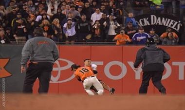 /deportes/angel-pagan-tacleo-a-fanatico-que-entro-al-terreno/34053.html